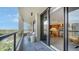 Balcony with view of the kitchen and partial ocean view at 1211 Gulf Of Mexico Dr # 603, Longboat Key, FL 34228