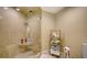 Spa-like bathroom with a glass shower, tile flooring and modern fixtures at 1211 Gulf Of Mexico Dr # 603, Longboat Key, FL 34228