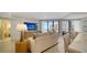 Bright living room with ocean view and modern furniture at 1211 Gulf Of Mexico Dr # 603, Longboat Key, FL 34228