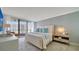 Spacious bedroom with ocean views and light and airy decor at 1211 Gulf Of Mexico Dr # 603, Longboat Key, FL 34228