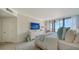 Bright bedroom with a king-size bed and a stunning ocean view at 1211 Gulf Of Mexico Dr # 603, Longboat Key, FL 34228
