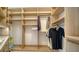 Large walk-in closet with ample shelving and hanging space at 1211 Gulf Of Mexico Dr # 603, Longboat Key, FL 34228