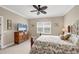 Spacious Primary bedroom with a king-size bed and ample space at 12810 Seasong Ter, Bradenton, FL 34211
