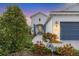 Inviting walkway leading to the front entrance of the home at 12810 Seasong Ter, Bradenton, FL 34211