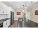 Island kitchen with granite countertops and stainless steel sink at 12810 Seasong Ter, Bradenton, FL 34211