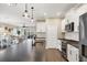 Modern kitchen with stainless steel appliances and ample counter space at 12810 Seasong Ter, Bradenton, FL 34211