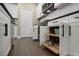 White shaker cabinets and pull-out drawers for extra storage at 12810 Seasong Ter, Bradenton, FL 34211