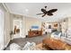 Open and airy living room with views to kitchen and bedroom at 12810 Seasong Ter, Bradenton, FL 34211