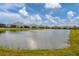 Stunning view of a tranquil pond in a luxury community at 12810 Seasong Ter, Bradenton, FL 34211