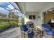 Screened porch with seating and grill at 12810 Seasong Ter, Bradenton, FL 34211