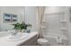 Clean bathroom, bathtub and shower combo at 15048 Cuzcorro Ct, Nokomis, FL 34275