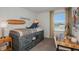 Bright bedroom with built-in storage and a workspace at 15048 Cuzcorro Ct, Nokomis, FL 34275