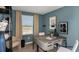 Home office with window and built-in shelving at 15052 Cuzcorro Ct, Nokomis, FL 34275