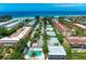 Aerial view of community near beach at 1603 Gulf N Dr # 24, Bradenton Beach, FL 34217