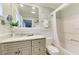 Clean bathroom with granite countertop and updated fixtures at 1603 Gulf N Dr # 24, Bradenton Beach, FL 34217