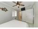 Spacious bedroom with a comfortable bed and adjacent bathroom at 1603 Gulf N Dr # 24, Bradenton Beach, FL 34217