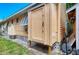 Exterior view of the property, showing additional storage at 1603 Gulf N Dr # 24, Bradenton Beach, FL 34217