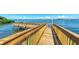 Enjoy waterfront views from this wooden dock at 1603 Gulf N Dr # 24, Bradenton Beach, FL 34217