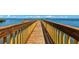 Spacious wooden dock offering scenic waterfront views at 1603 Gulf N Dr # 24, Bradenton Beach, FL 34217
