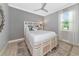 Bright bedroom with a comfy bed and neutral decor at 16806 5Th Ne Ter, Bradenton, FL 34212