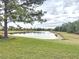 Peaceful lake view with lush green space at 16806 5Th Ne Ter, Bradenton, FL 34212