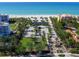 Beautiful aerial view of the beachfront community, highlighting the building and its lot location at 1906 Harbour Links Cir # 14, Longboat Key, FL 34228