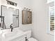 Clean bathroom with updated vanity and a large window at 1906 Harbour Links Cir # 14, Longboat Key, FL 34228