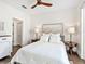 Comfortable bedroom with cozy bedding and ample natural light at 1906 Harbour Links Cir # 14, Longboat Key, FL 34228