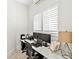 Bright home office features built-in workspace and large window at 1906 Harbour Links Cir # 14, Longboat Key, FL 34228