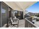 Private balcony with seating area and views of community at 204 3Rd W St # 203, Bradenton, FL 34205