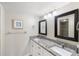 Double vanity bathroom with granite countertop at 204 3Rd W St # 203, Bradenton, FL 34205