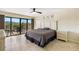 King-size bed, access to balcony and pool view at 204 3Rd W St # 203, Bradenton, FL 34205