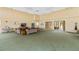 Spacious common area with comfortable seating and a TV at 204 3Rd W St # 203, Bradenton, FL 34205