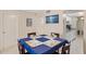 Cozy dining area featuring a dark wood table and blue tablecloth at 204 3Rd W St # 203, Bradenton, FL 34205