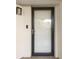 Front door of condo with security screen door at 204 3Rd W St # 203, Bradenton, FL 34205