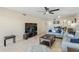 Bright living room with comfy couches and a large TV at 204 3Rd W St # 203, Bradenton, FL 34205