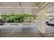 Reserved parking spot in a well-lit garage with ample space at 204 3Rd W St # 203, Bradenton, FL 34205