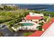 Community pool with surrounding patio and landscaping at 204 3Rd W St # 203, Bradenton, FL 34205