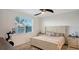 Spacious bedroom with large window and en-suite bathroom at 204 Villoresi Blvd, Nokomis, FL 34275