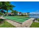 Bocce ball court with lake view in Toscana Isles community at 204 Villoresi Blvd, Nokomis, FL 34275