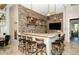 Modern bar with brick wall in the clubhouse at 204 Villoresi Blvd, Nokomis, FL 34275