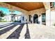 Elegant community entrance with stonework and arched entryway at 204 Villoresi Blvd, Nokomis, FL 34275