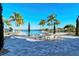 Resort-style pool with fire pit and lounge chairs at 204 Villoresi Blvd, Nokomis, FL 34275