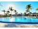 Community pool with clubhouse in background at 204 Villoresi Blvd, Nokomis, FL 34275