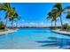 Large community pool with lake view at 204 Villoresi Blvd, Nokomis, FL 34275