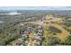 Aerial view of a house and surrounding golf course at 2305 Little Country Rd, Parrish, FL 34219
