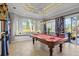 Game room with pool table and expansive lake view at 2305 Little Country Rd, Parrish, FL 34219