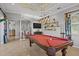 Game room with pool table and stylish light fixtures at 2305 Little Country Rd, Parrish, FL 34219