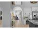 Bright kitchen boasts granite counters, custom cabinetry, and breakfast bar at 2305 Little Country Rd, Parrish, FL 34219