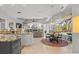 Modern kitchen with granite countertops and island seating at 2305 Little Country Rd, Parrish, FL 34219